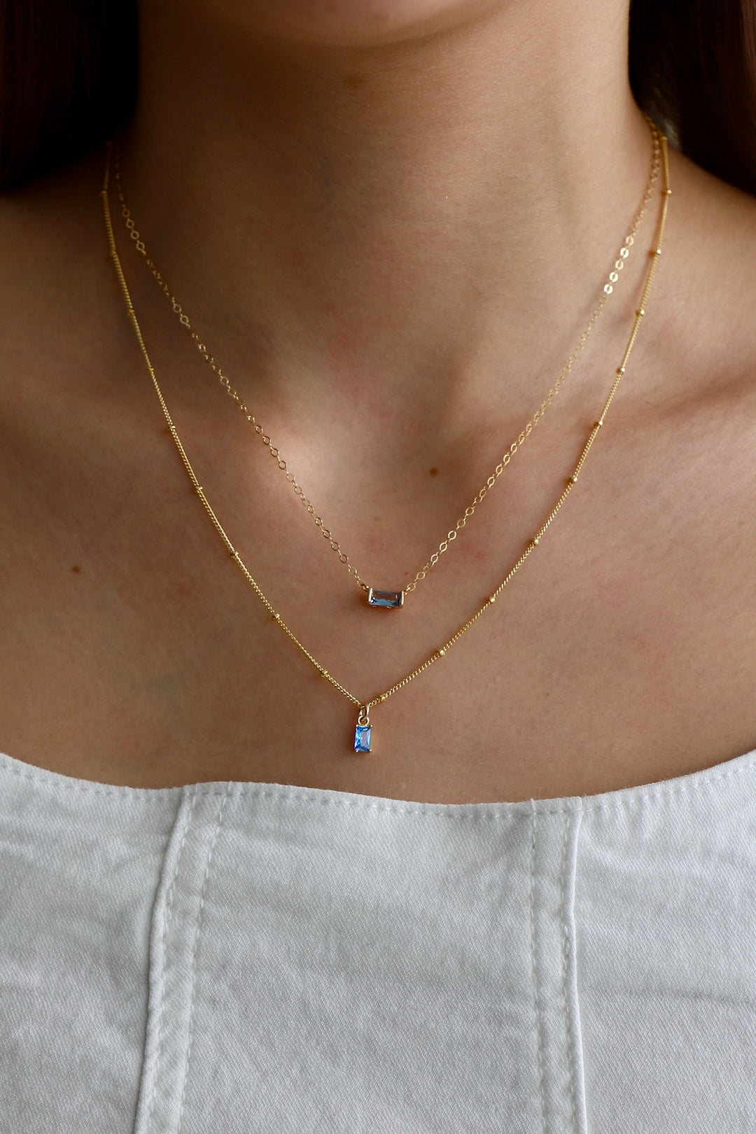 FLOATING AQUA CZ BAGUETTE NECKLACE