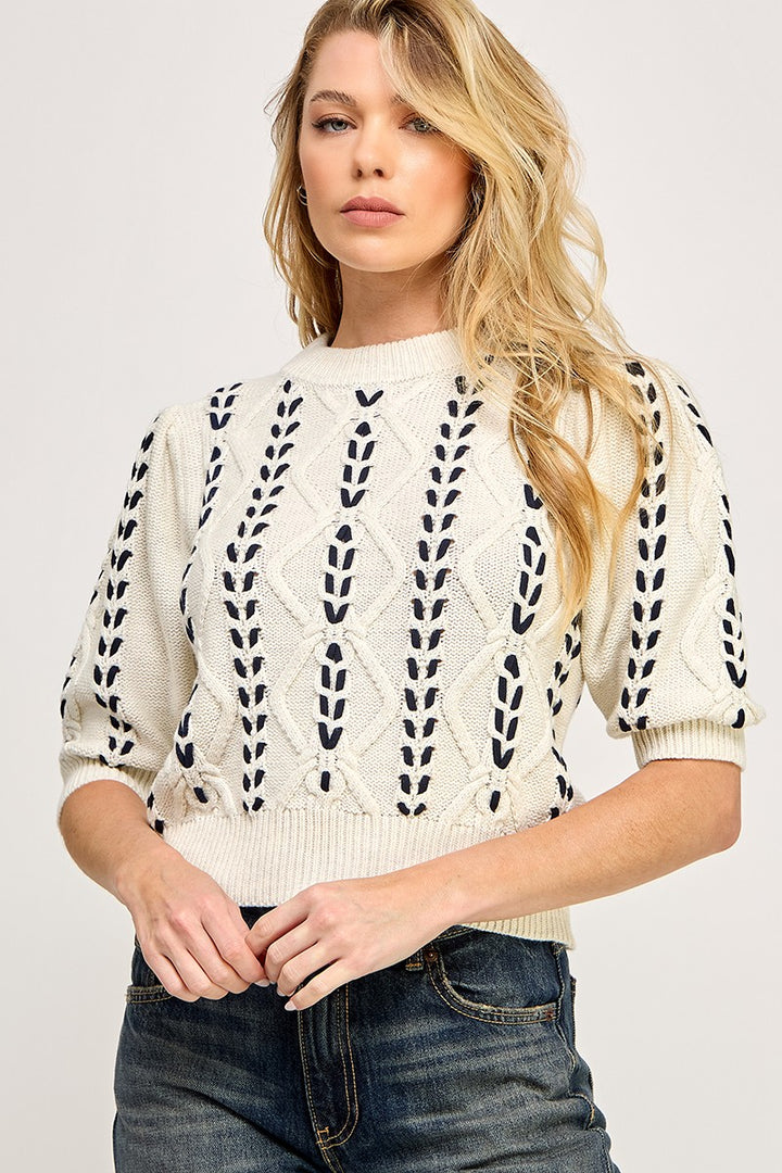 FARM CABLE KNIT SWEATER